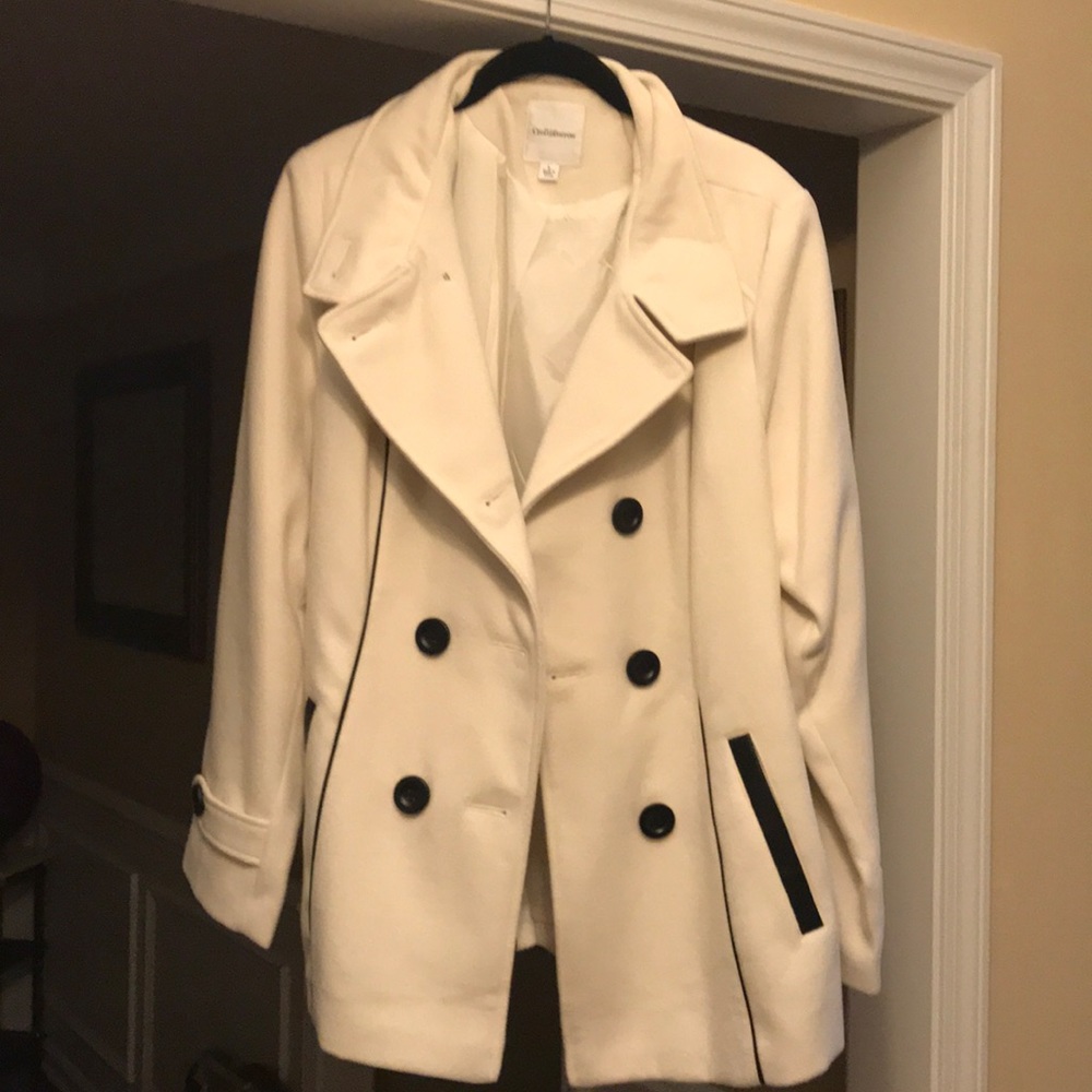 White pea coat with black trim